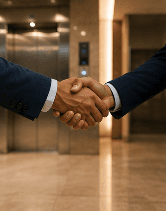 Two people shaking hands to confirm the order